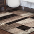 12' Black Brown And Beige Patchwork Runner Rug